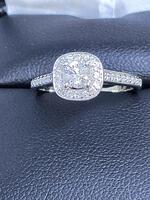 Lady's Diamond Engagement Ring: 2.1g 10k-W/G, Cut Diamond 0.62ctw Size 5 1/2