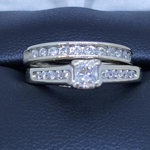 Lady's Diamond Wedding Set: 5.4g 14k-W/G, 1-Radiant Cut Diamond 0.27ctw, 12-Round Brilliant Cut Diam