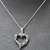 10K White Gold Necklace with White Gold Diamond and Sapphire Heart Pendant