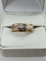  Size: 9 10K Two tone Gold band 5.9mm thick 7.20gms 