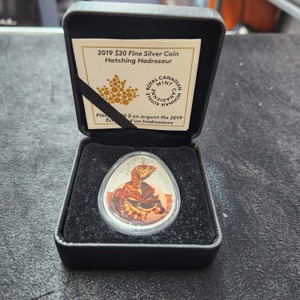 Royal Canadian Mint 2019 $20 Fine Silver Coin: Glow in the Dark Hatching Hadrosaur