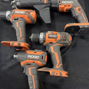 Ridgid 2 drills, impact driver, drywall gun with attachment